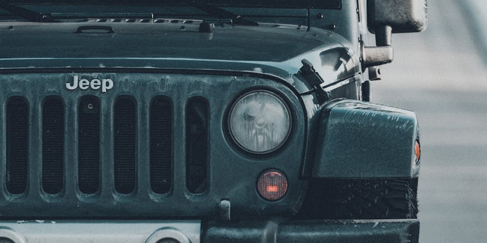 Black Jeep Wrangler on road